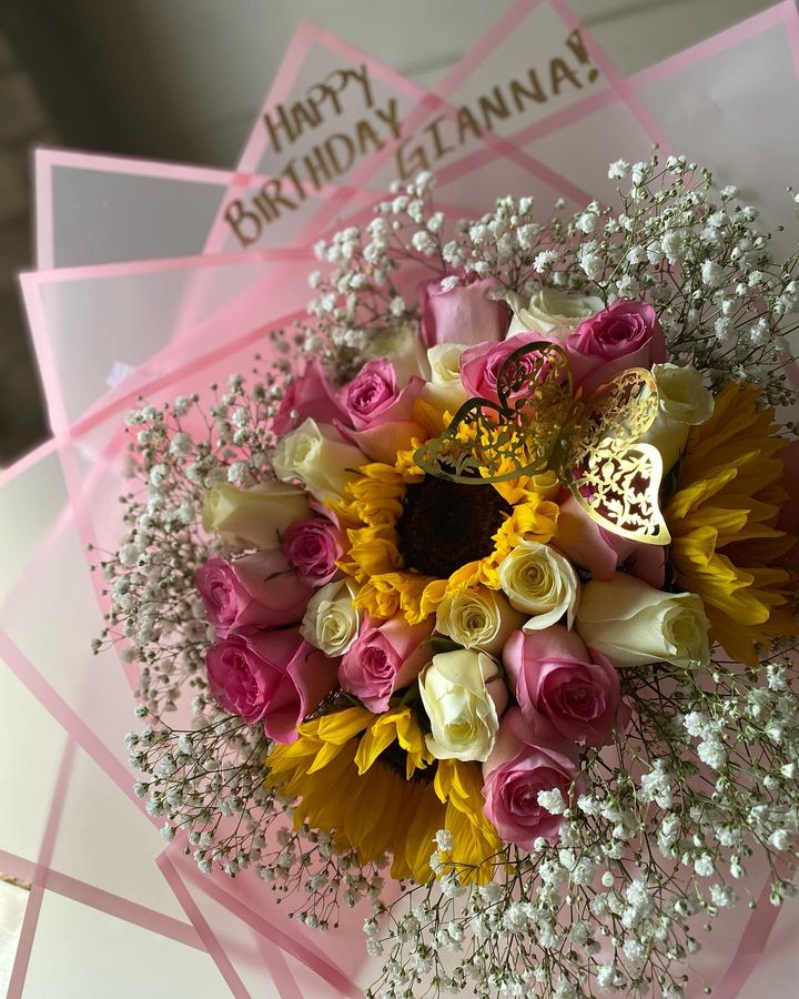 Sunflower and roses